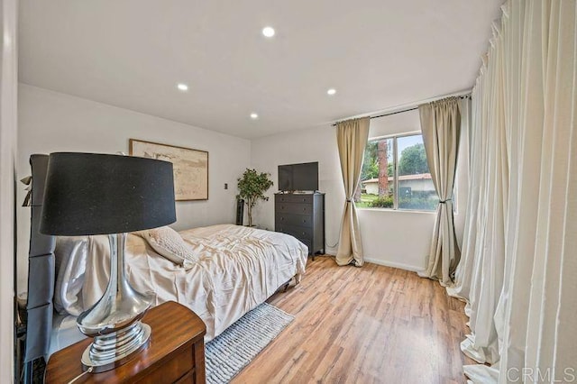 6009 Rancho Mission Rd Unit 102, San Diego, CA 92108 - bedroom with light wood finished floors and recessed lighting