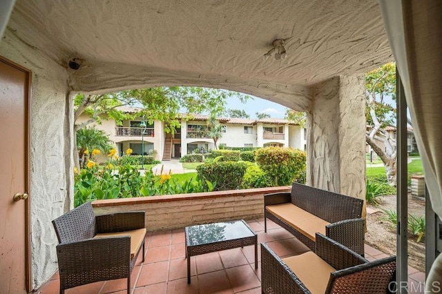 6009 Rancho Mission Rd Unit 102, San Diego, CA 92108 - view of patio with an outdoor hangout area