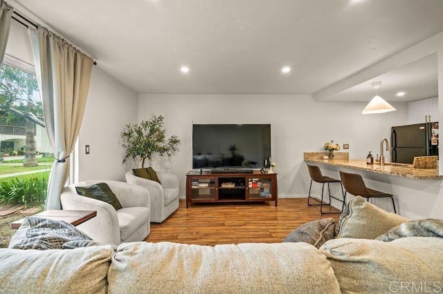 6009 Rancho Mission Rd Unit 102, San Diego, CA 92108 - living area with recessed lighting and wood finished floors