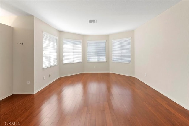 6879 Mission Grove Pkwy N, Riverside, CA 92506 - unfurnished room with wood finished floors