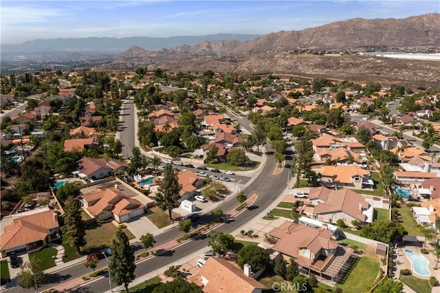 6879 Mission Grove Pkwy N, Riverside, CA 92506 - aerial view of property and surrounding area with nearby suburban area