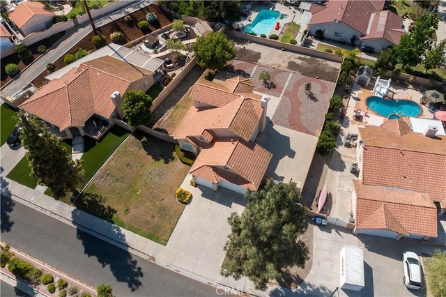 6879 Mission Grove Pkwy N, Riverside, CA 92506 - aerial perspective of suburban area featuring a pool