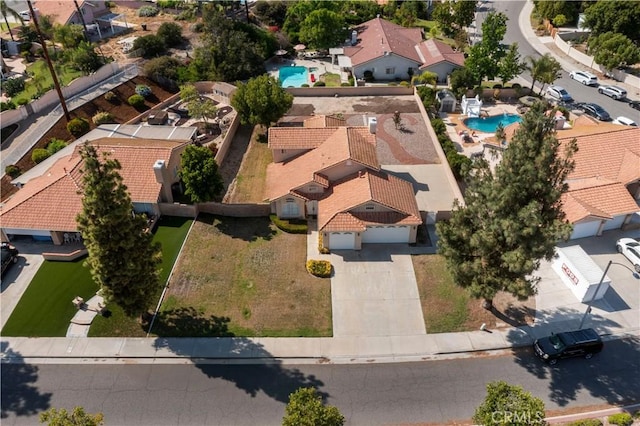 6879 Mission Grove Pkwy N, Riverside, CA 92506 - aerial view of property and surrounding area featuring a pool