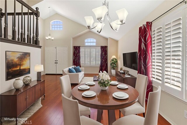 6879 Mission Grove Pkwy N, Riverside, CA 92506 - dining room featuring a chandelier, wood finished floors, and high vaulted ceiling