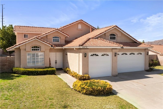 6879 Mission Grove Pkwy N, Riverside, CA 92506 - view of front facade with stucco siding, driveway, a garage, and a tile roof