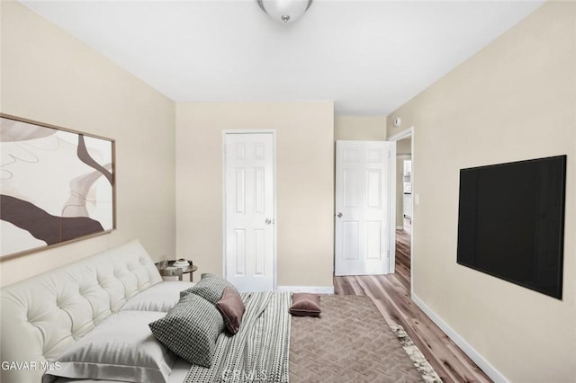 37858 10th St E, Palmdale, CA 93550 - bedroom featuring wood finished floors and baseboards