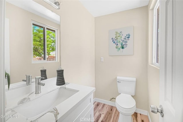 37858 10th St E, Palmdale, CA 93550 - half bath featuring vanity and wood finished floors