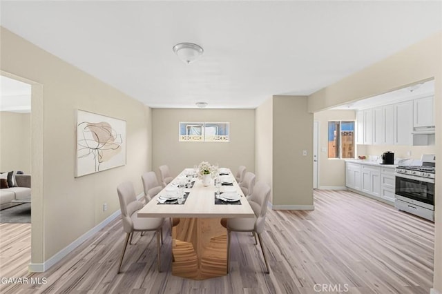 37858 10th St E, Palmdale, CA 93550 - dining space featuring light wood-type flooring and baseboards