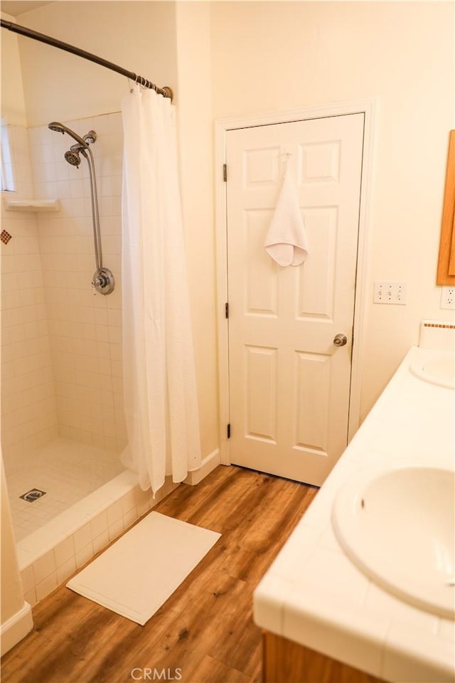 1639 La Selva Ave, Grover Beach, CA 93433 - full bath featuring tiled shower, wood finished floors, and double vanity