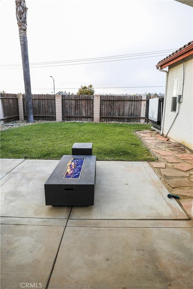 1639 La Selva Ave, Grover Beach, CA 93433 - fenced backyard featuring a fire pit and a patio area