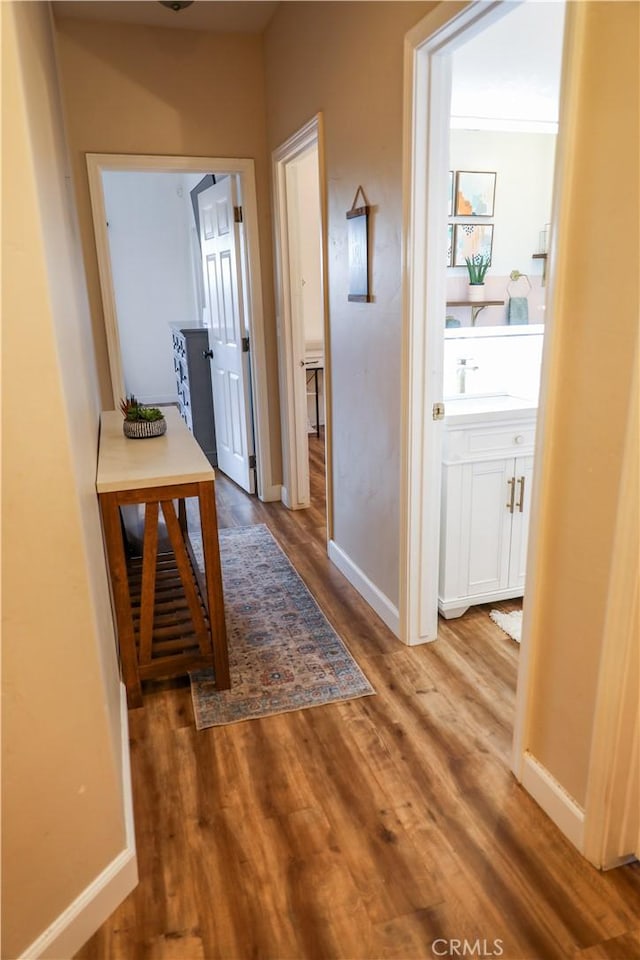 1639 La Selva Ave, Grover Beach, CA 93433 - corridor featuring wood finished floors and baseboards