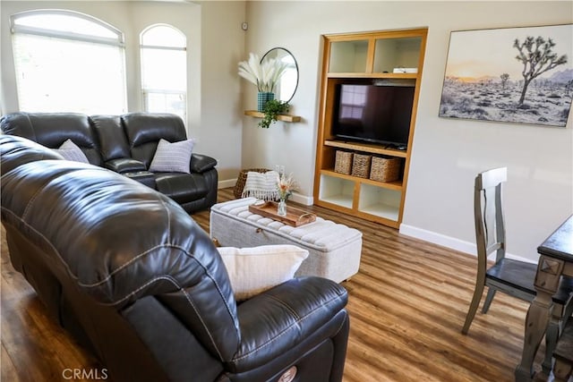 1639 La Selva Ave, Grover Beach, CA 93433 - living room featuring wood finished floors and built in features