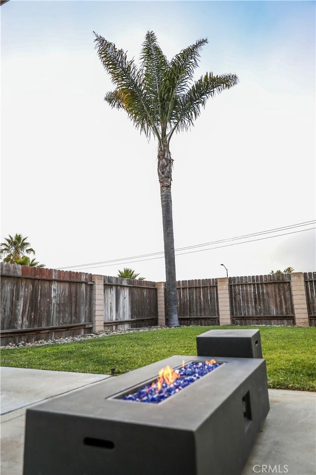 1639 La Selva Ave, Grover Beach, CA 93433 - fenced backyard with an outdoor fire pit