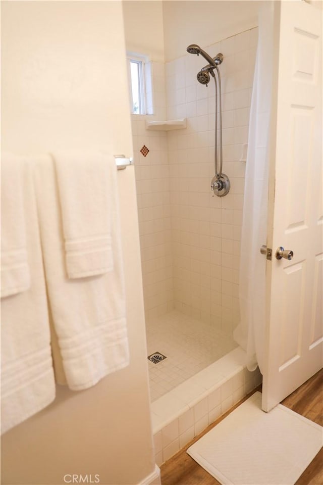 1639 La Selva Ave, Grover Beach, CA 93433 - bathroom featuring a stall shower and wood finished floors