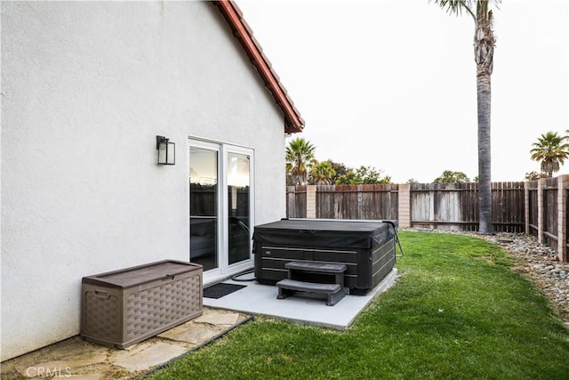 1639 La Selva Ave, Grover Beach, CA 93433 - fenced backyard featuring a hot tub and a patio area