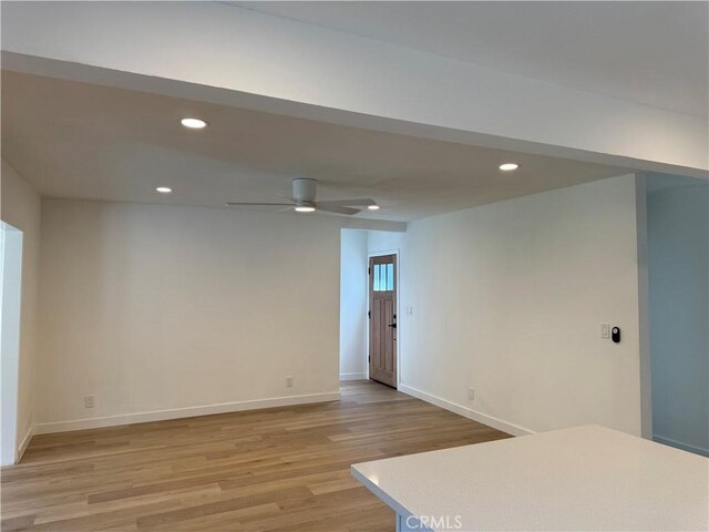 208 S Gaffney Ave, San Dimas, CA 91773 - below grade area with ceiling fan, light wood-style flooring, and recessed lighting