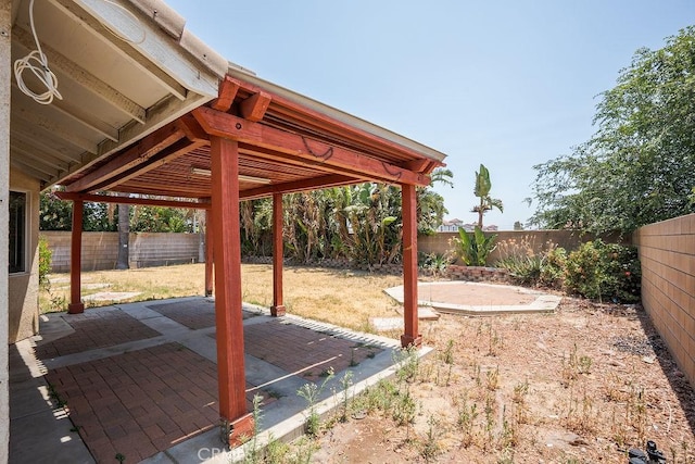 16205 Seville Ave, Fontana, CA 92335 - fenced backyard with a patio area