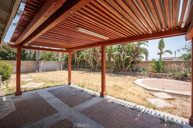 16205 Seville Ave, Fontana, CA 92335 - fenced backyard featuring a patio area