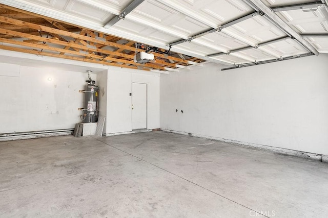 16205 Seville Ave, Fontana, CA 92335 - garage featuring strapped water heater and a garage door opener