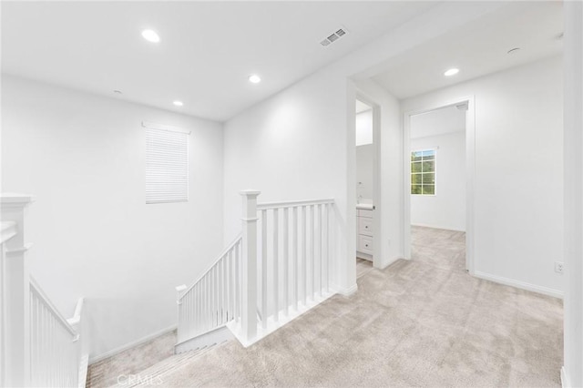 16471 Globetrotter St, Chino, CA 91708 - hallway featuring an upstairs landing, light carpet, and recessed lighting
