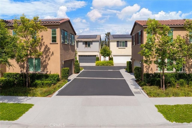 16471 Globetrotter St, Chino, CA 91708 - view of asphalt driveway with a residential view