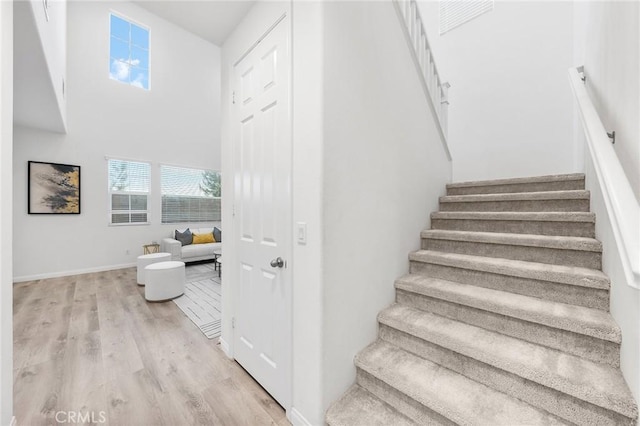 16471 Globetrotter St, Chino, CA 91708 - staircase with wood finished floors and a towering ceiling