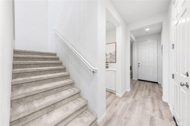 16471 Globetrotter St, Chino, CA 91708 - staircase featuring wood finished floors and recessed lighting