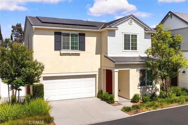 16471 Globetrotter St, Chino, CA 91708 - traditional-style home with an attached garage, solar panels, concrete driveway, and stucco siding