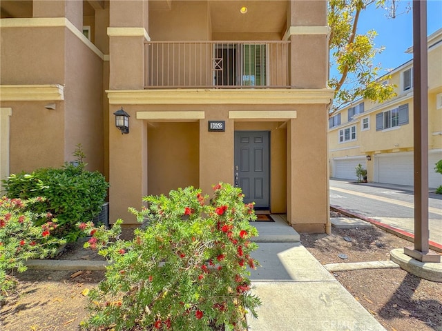 1652 Hickory Nut Pl, Chula Vista, CA 91915 - entrance to property with stucco siding and a balcony