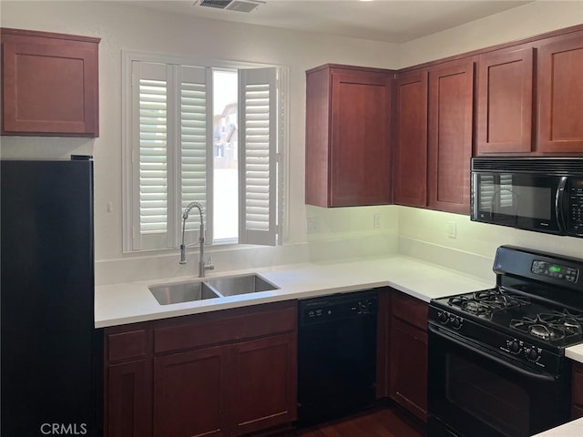 1652 Hickory Nut Pl, Chula Vista, CA 91915 - kitchen with black appliances and light countertops