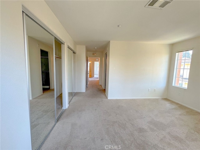 1652 Hickory Nut Pl, Chula Vista, CA 91915 - unfurnished bedroom with light carpet and multiple closets