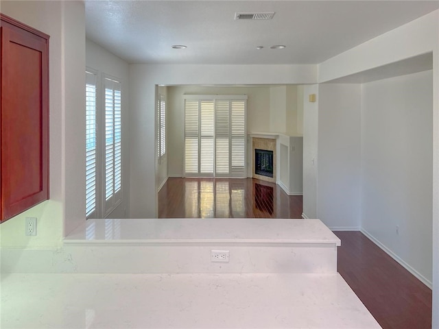 1652 Hickory Nut Pl, Chula Vista, CA 91915 - unfurnished living room with dark wood finished floors and a fireplace