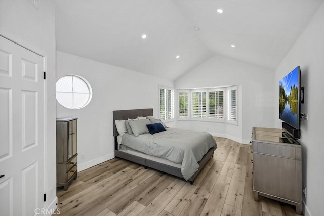 24523 Via Esquina, Calabasas, CA 91302 - bedroom featuring light wood-type flooring, lofted ceiling, and recessed lighting