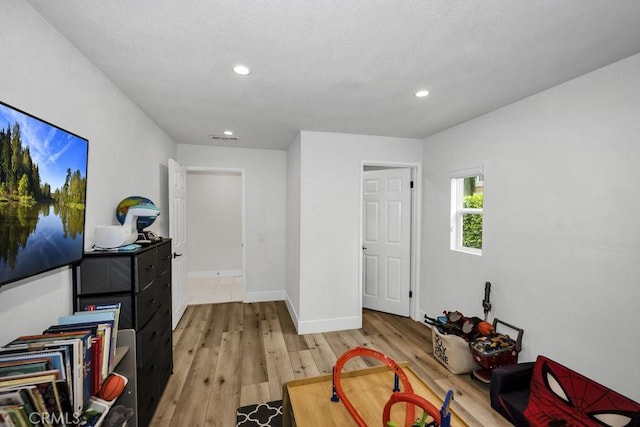24523 Via Esquina, Calabasas, CA 91302 - playroom with light wood-type flooring and recessed lighting