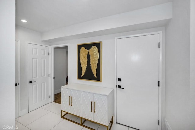 24523 Via Esquina, Calabasas, CA 91302 - entryway featuring light tile patterned floors and recessed lighting