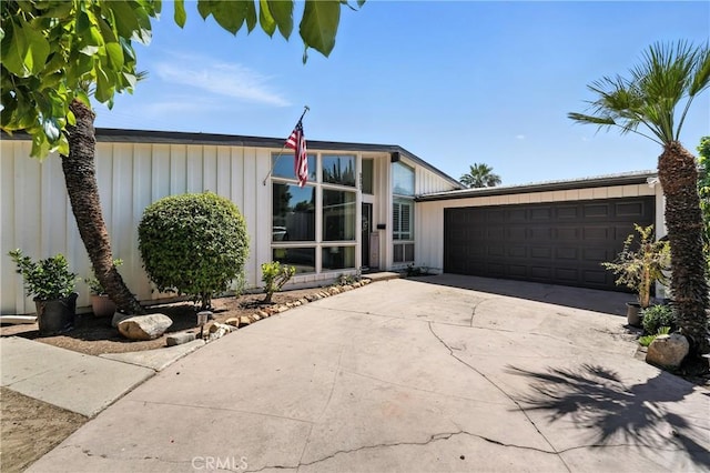 951 W Olive St, Corona, CA 92882 - view of front of house with an attached garage and concrete driveway