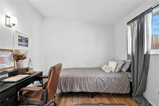 951 W Olive St, Corona, CA 92882 - bedroom featuring wood finished floors and a desk