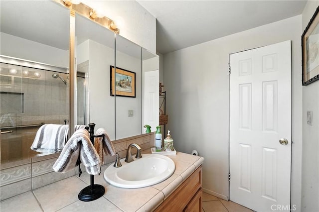 951 W Olive St, Corona, CA 92882 - bathroom with vanity, tile patterned floors, and tiled shower