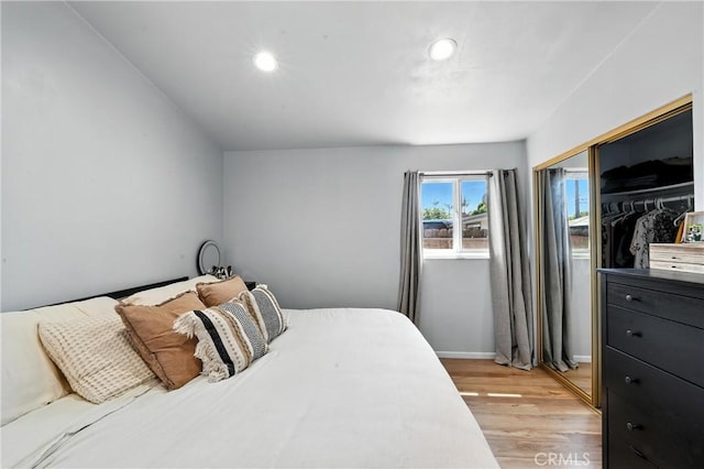 951 W Olive St, Corona, CA 92882 - bedroom featuring light wood-type flooring, a closet, and recessed lighting