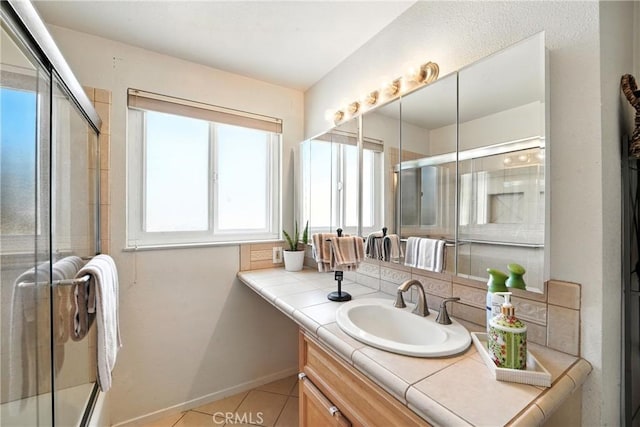 951 W Olive St, Corona, CA 92882 - bathroom with vanity, tile patterned flooring, and a shower with shower door