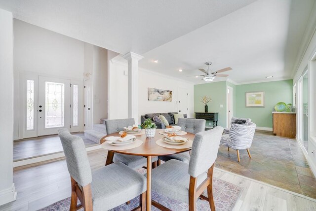 15020 Penasquitos Dr, Rancho Penasquitos, CA 92129 - dining area with healthy amount of natural light, light wood finished floors, ornamental molding, decorative columns, and recessed lighting
