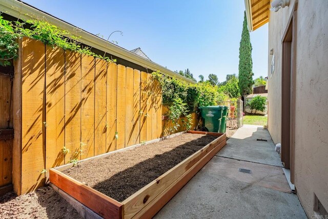 15020 Penasquitos Dr, Rancho Penasquitos, CA 92129 - view of patio / terrace featuring a vegetable garden