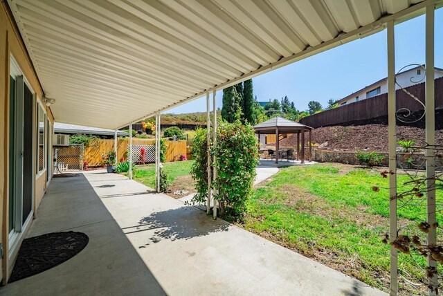 15020 Penasquitos Dr, Rancho Penasquitos, CA 92129 - fenced backyard with a gazebo and a patio area