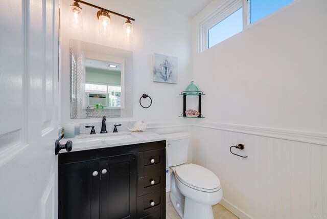 15020 Penasquitos Dr, Rancho Penasquitos, CA 92129 - bathroom with wainscoting and vanity