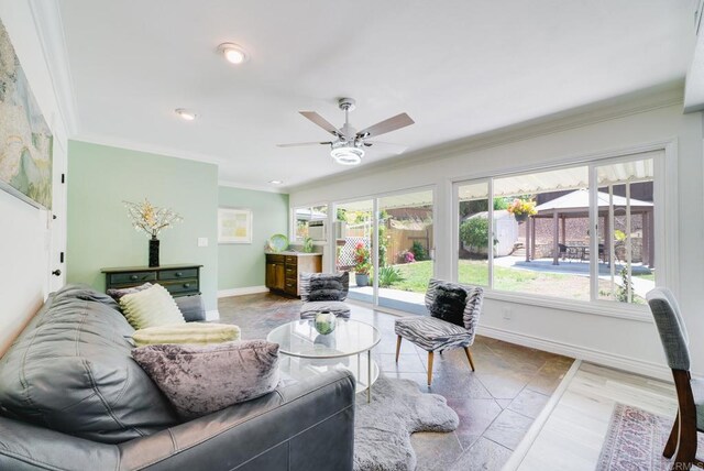 15020 Penasquitos Dr, Rancho Penasquitos, CA 92129 - living area featuring crown molding, ceiling fan, stone tile flooring, and recessed lighting