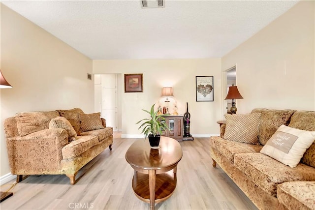 1582 Hardt St, San Bernardino, CA 92408 - living area with light wood-style floors and baseboards