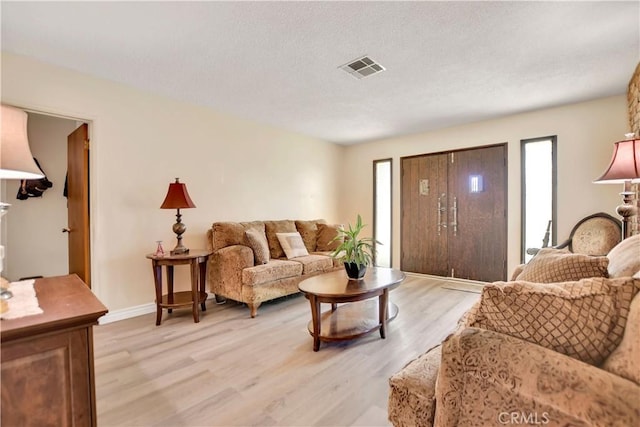 1582 Hardt St, San Bernardino, CA 92408 - living area featuring light wood finished floors and baseboards