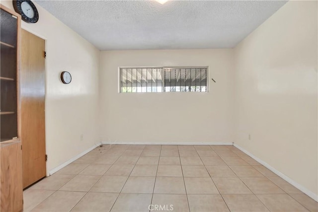 1582 Hardt St, San Bernardino, CA 92408 - spare room featuring a textured ceiling