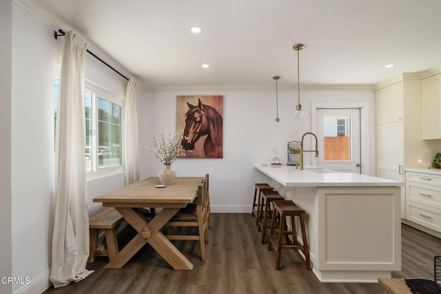 208 S 4th St, Santa Paula, CA 93060 - dining area with dark wood-style floors, ornamental molding, and recessed lighting