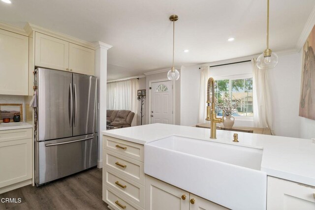 208 S 4th St, Santa Paula, CA 93060 - kitchen featuring freestanding refrigerator, dark wood-type flooring, light countertops, recessed lighting, and crown molding
